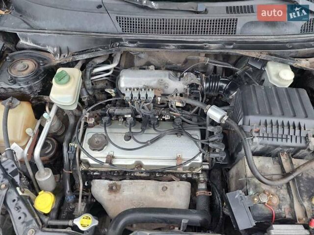 Чорний Чері Тігго, об'ємом двигуна 2 л та пробігом 436 тис. км за 3100 $, фото 22 на Automoto.ua