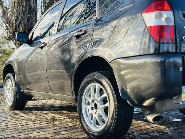 Черный Чери Тигго, объемом двигателя 2.4 л и пробегом 186 тыс. км за 3400 $, фото 7 на Automoto.ua