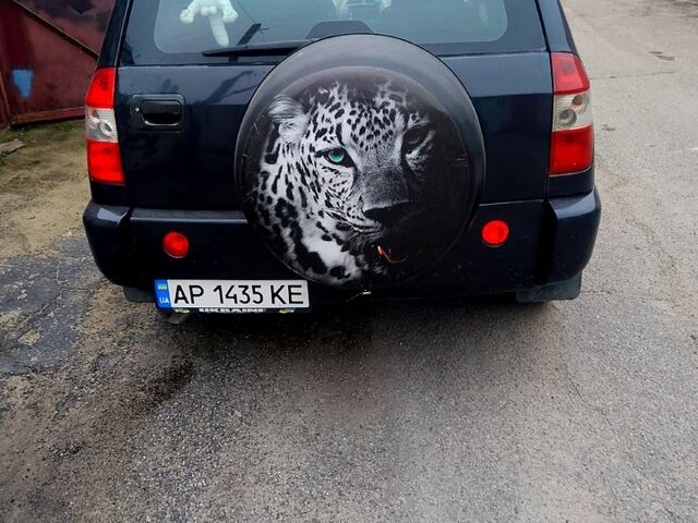 Черный Чери Тигго, объемом двигателя 2 л и пробегом 220 тыс. км за 3400 $, фото 2 на Automoto.ua