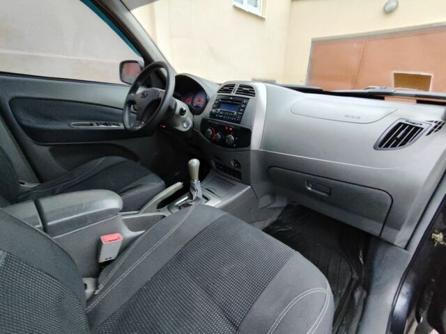 Чорний Чері Тігго, об'ємом двигуна 2 л та пробігом 170 тис. км за 4300 $, фото 9 на Automoto.ua