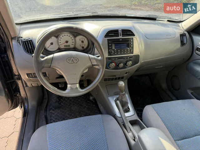 Черный Чери Тигго, объемом двигателя 2.4 л и пробегом 333 тыс. км за 3000 $, фото 12 на Automoto.ua