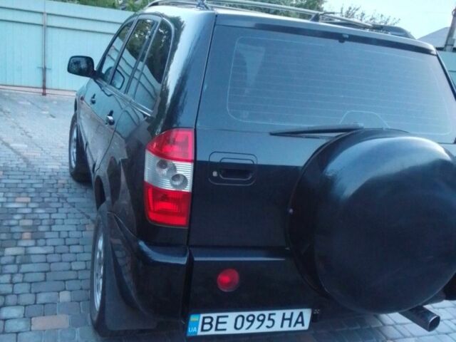 Черный Чери Тигго, объемом двигателя 2.4 л и пробегом 180 тыс. км за 4000 $, фото 1 на Automoto.ua