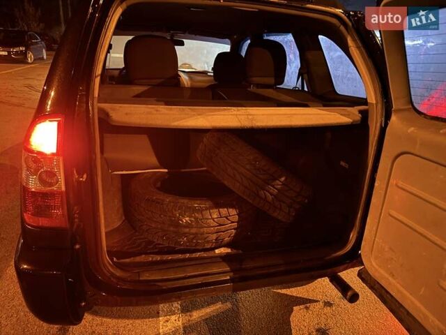 Черный Чери Тигго, объемом двигателя 2 л и пробегом 170 тыс. км за 3000 $, фото 5 на Automoto.ua