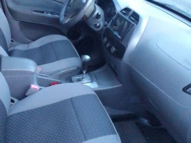 Черный Чери Тигго, объемом двигателя 2.4 л и пробегом 180 тыс. км за 4000 $, фото 3 на Automoto.ua