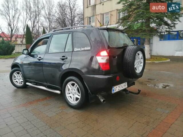 Чорний Чері Тігго, об'ємом двигуна 2 л та пробігом 248 тис. км за 4100 $, фото 6 на Automoto.ua