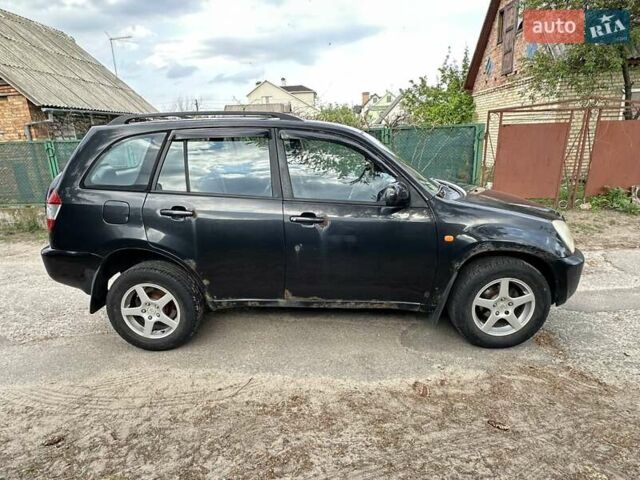 Черный Чери Тигго, объемом двигателя 2.35 л и пробегом 170 тыс. км за 2750 $, фото 6 на Automoto.ua