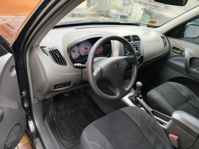 Чорний Чері Тігго, об'ємом двигуна 2 л та пробігом 170 тис. км за 4300 $, фото 5 на Automoto.ua