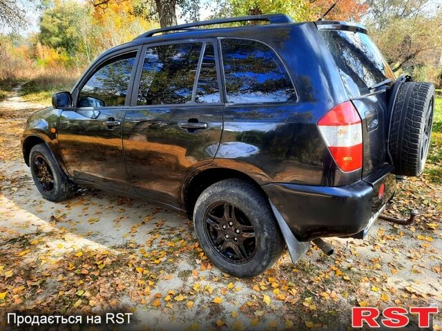 Чорний Чері Тігго, об'ємом двигуна 2 л та пробігом 177 тис. км за 3800 $, фото 3 на Automoto.ua