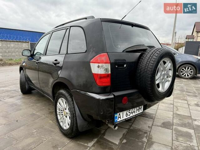 Черный Чери Тигго, объемом двигателя 2.35 л и пробегом 192 тыс. км за 3500 $, фото 2 на Automoto.ua