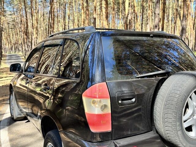 Чорний Чері Тігго, об'ємом двигуна 2 л та пробігом 250 тис. км за 3200 $, фото 7 на Automoto.ua