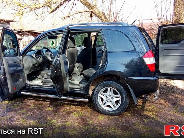 Черный Чери Тигго, объемом двигателя 2 л и пробегом 278 тыс. км за 4200 $, фото 2 на Automoto.ua