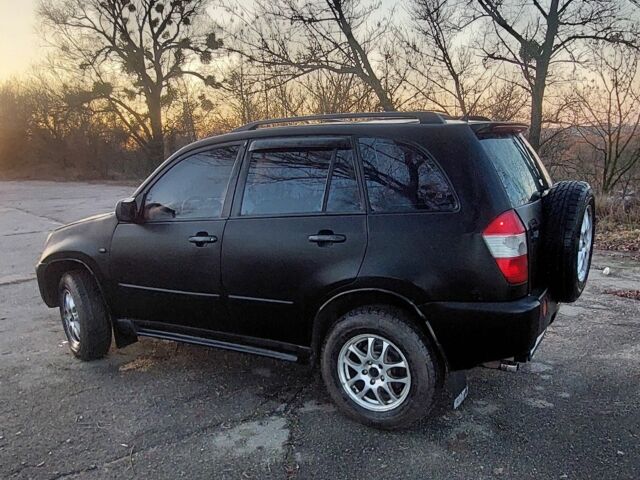 Черный Чери Тигго, объемом двигателя 2.4 л и пробегом 193 тыс. км за 2100 $, фото 11 на Automoto.ua