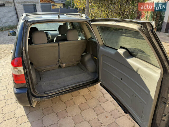 Черный Чери Тигго, объемом двигателя 2.4 л и пробегом 333 тыс. км за 3000 $, фото 13 на Automoto.ua