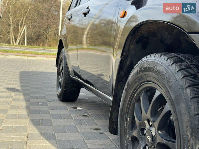 Черный Чери Тигго, объемом двигателя 2.35 л и пробегом 165 тыс. км за 3700 $, фото 6 на Automoto.ua