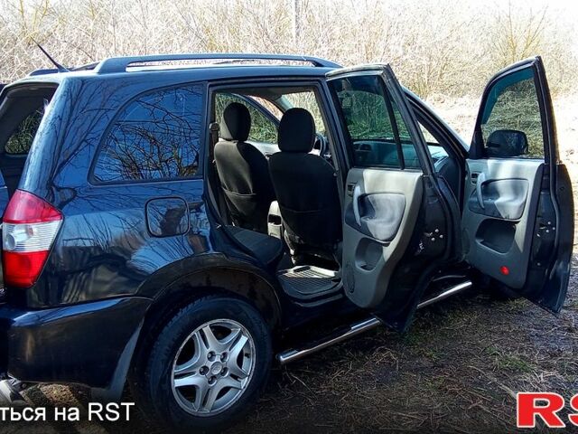 Черный Чери Тигго, объемом двигателя 2 л и пробегом 278 тыс. км за 4200 $, фото 3 на Automoto.ua