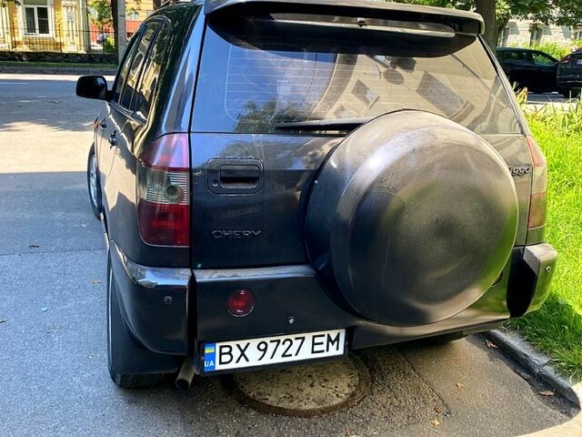 Чорний Чері Тігго, об'ємом двигуна 2 л та пробігом 260 тис. км за 3200 $, фото 1 на Automoto.ua