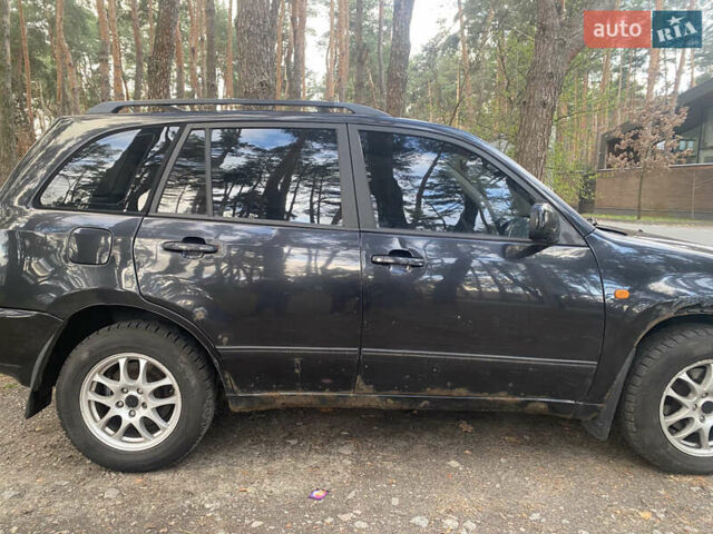 Черный Чери Тигго, объемом двигателя 2.4 л и пробегом 300 тыс. км за 3000 $, фото 10 на Automoto.ua