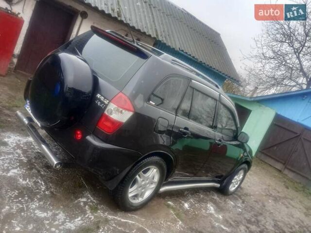 Черный Чери Тигго, объемом двигателя 2.35 л и пробегом 138 тыс. км за 4800 $, фото 2 на Automoto.ua