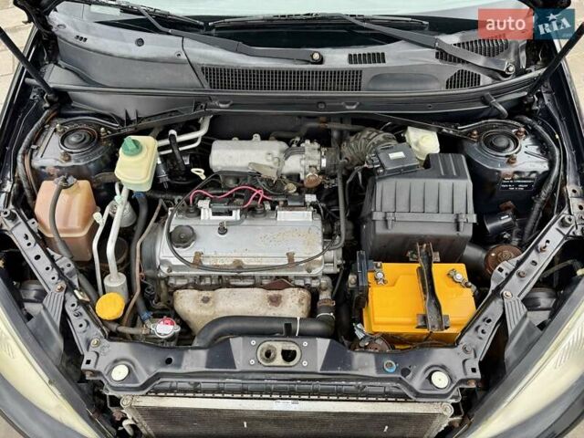 Черный Чери Тигго, объемом двигателя 2.35 л и пробегом 192 тыс. км за 3500 $, фото 16 на Automoto.ua