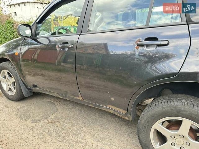 Черный Чери Тигго, объемом двигателя 2.35 л и пробегом 170 тыс. км за 2750 $, фото 7 на Automoto.ua