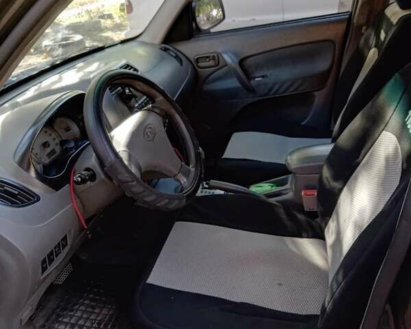 Черный Чери Тигго, объемом двигателя 2.4 л и пробегом 128 тыс. км за 4500 $, фото 3 на Automoto.ua