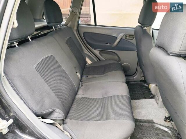 Чорний Чері Тігго, об'ємом двигуна 2 л та пробігом 170 тис. км за 4300 $, фото 6 на Automoto.ua