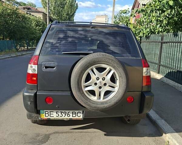 Чорний Чері Тігго, об'ємом двигуна 2 л та пробігом 160 тис. км за 3700 $, фото 3 на Automoto.ua