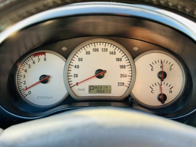 Черный Чери Тигго, объемом двигателя 2.4 л и пробегом 186 тыс. км за 3400 $, фото 14 на Automoto.ua