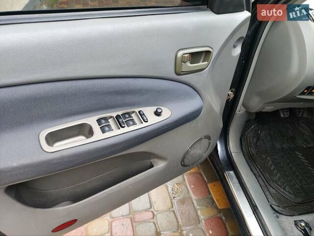 Чорний Чері Тігго, об'ємом двигуна 2 л та пробігом 170 тис. км за 4300 $, фото 10 на Automoto.ua