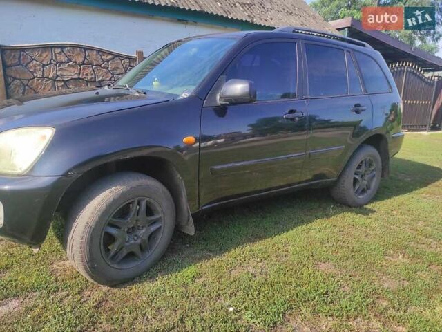 Черный Чери Тигго, объемом двигателя 2.35 л и пробегом 250 тыс. км за 3500 $, фото 4 на Automoto.ua