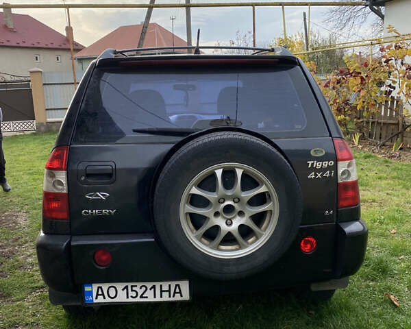 Черный Чери Тигго, объемом двигателя 2.4 л и пробегом 144 тыс. км за 4100 $, фото 1 на Automoto.ua
