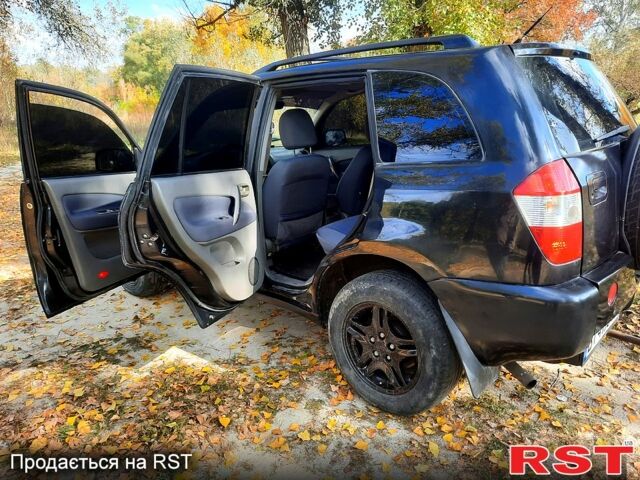 Чорний Чері Тігго, об'ємом двигуна 2 л та пробігом 177 тис. км за 3800 $, фото 2 на Automoto.ua