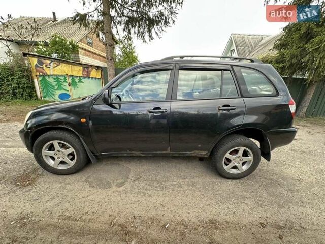Черный Чери Тигго, объемом двигателя 2.35 л и пробегом 170 тыс. км за 2750 $, фото 5 на Automoto.ua