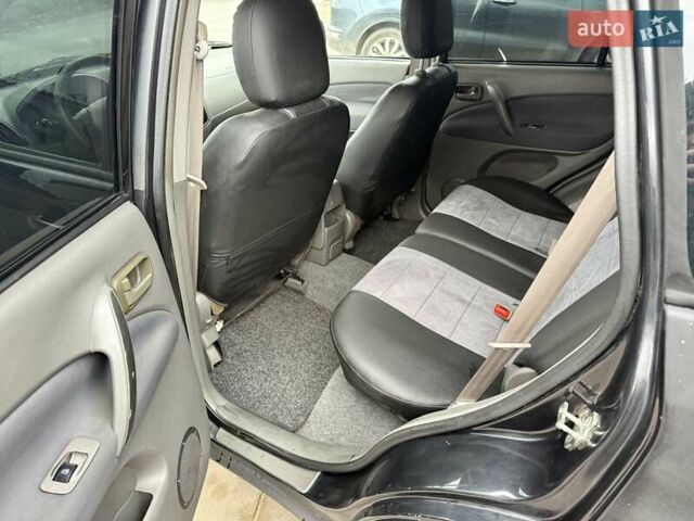 Черный Чери Тигго, объемом двигателя 2.35 л и пробегом 192 тыс. км за 3500 $, фото 10 на Automoto.ua