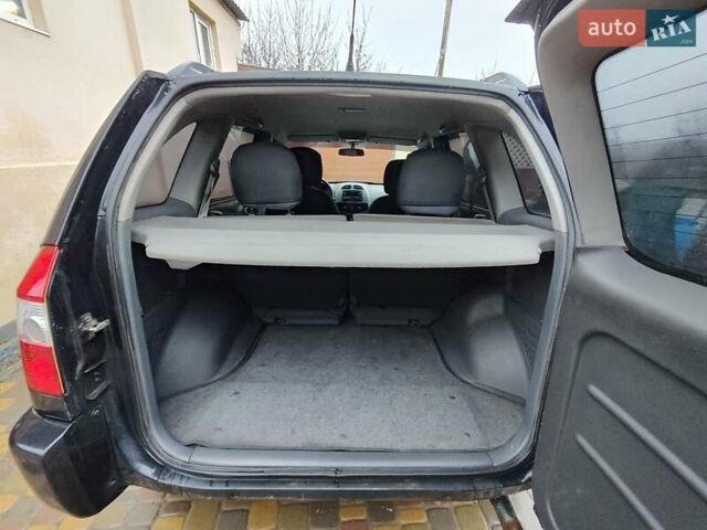 Чорний Чері Тігго, об'ємом двигуна 2 л та пробігом 170 тис. км за 4300 $, фото 11 на Automoto.ua