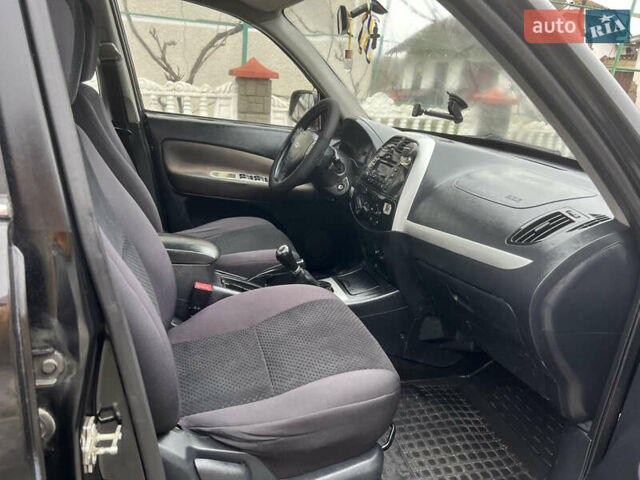 Чорний Чері Тігго, об'ємом двигуна 1.6 л та пробігом 241 тис. км за 3450 $, фото 23 на Automoto.ua