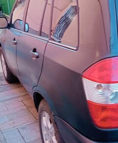 Черный Чери Тигго, объемом двигателя 1.97 л и пробегом 241 тыс. км за 3500 $, фото 2 на Automoto.ua