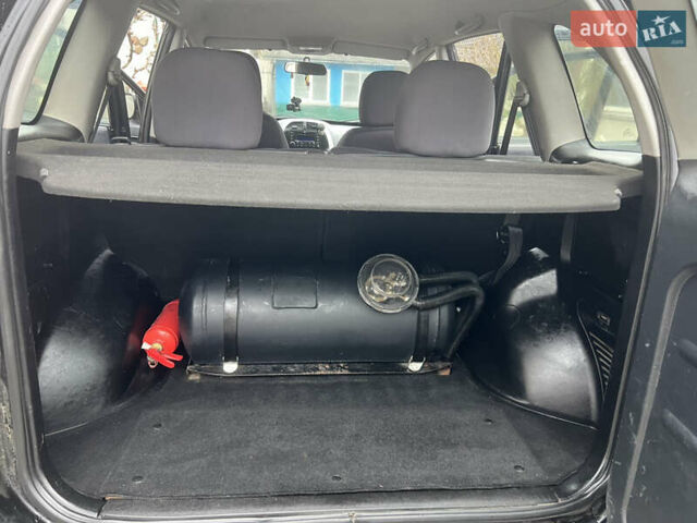 Чорний Чері Тігго, об'ємом двигуна 1.6 л та пробігом 241 тис. км за 3450 $, фото 36 на Automoto.ua