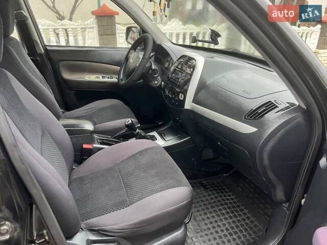Чорний Чері Тігго, об'ємом двигуна 1.6 л та пробігом 241 тис. км за 3450 $, фото 20 на Automoto.ua