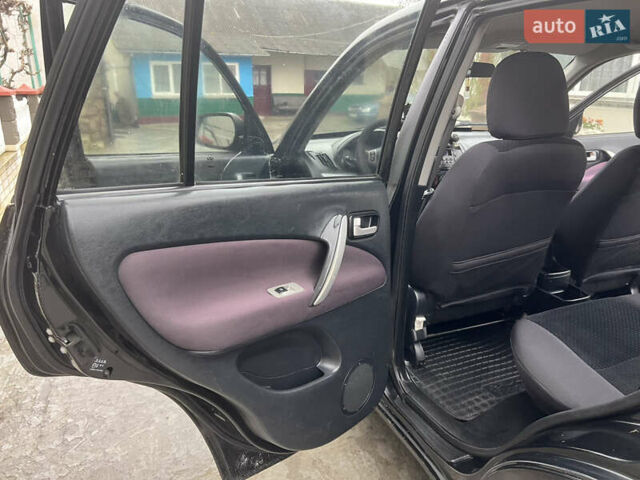 Черный Чери Тигго, объемом двигателя 1.6 л и пробегом 240 тыс. км за 3599 $, фото 34 на Automoto.ua