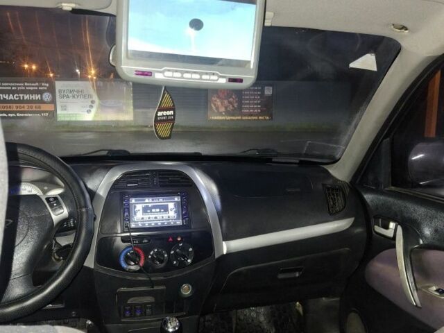 Черный Чери Тигго, объемом двигателя 1.8 л и пробегом 111 тыс. км за 2850 $, фото 6 на Automoto.ua