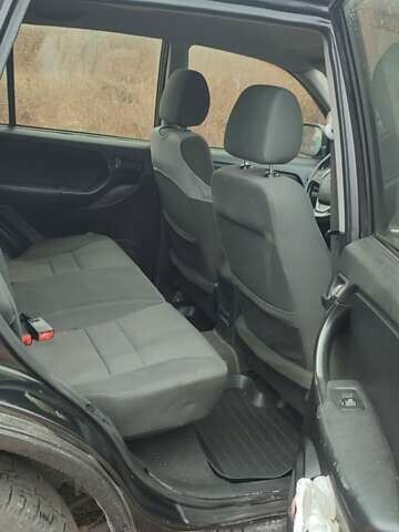 Чорний Чері Тігго, об'ємом двигуна 1.8 л та пробігом 171 тис. км за 4500 $, фото 1 на Automoto.ua