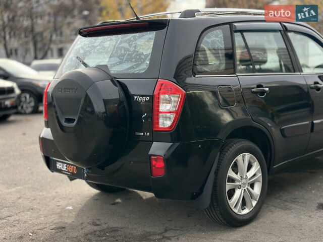 Черный Чери Тигго, объемом двигателя 1.85 л и пробегом 140 тыс. км за 5699 $, фото 17 на Automoto.ua
