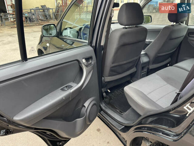 Чорний Чері Тігго, об'ємом двигуна 1.8 л та пробігом 59 тис. км за 5950 $, фото 18 на Automoto.ua