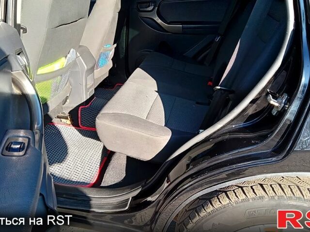 Черный Чери Тигго, объемом двигателя 1.8 л и пробегом 178 тыс. км за 5600 $, фото 8 на Automoto.ua