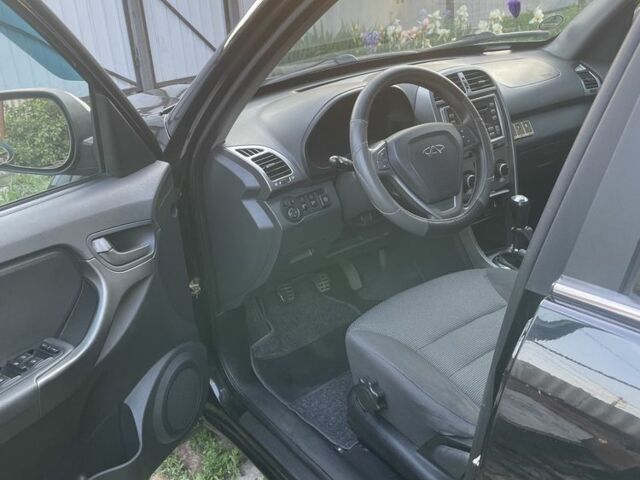 Черный Чери Тигго, объемом двигателя 1.8 л и пробегом 129 тыс. км за 5500 $, фото 11 на Automoto.ua