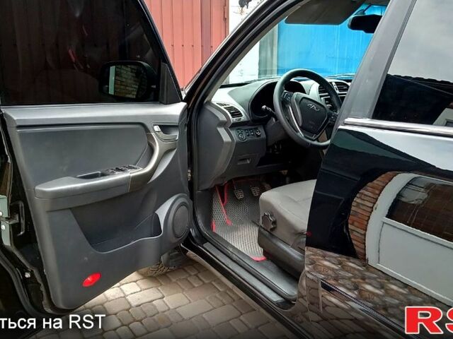 Черный Чери Тигго, объемом двигателя 1.8 л и пробегом 180 тыс. км за 5900 $, фото 6 на Automoto.ua