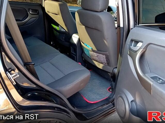 Черный Чери Тигго, объемом двигателя 1.8 л и пробегом 178 тыс. км за 5600 $, фото 10 на Automoto.ua