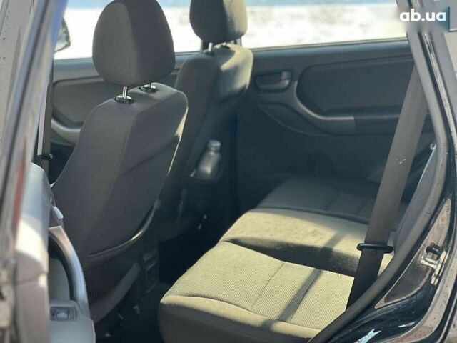 Черный Чери Тигго, объемом двигателя 1.8 л и пробегом 104 тыс. км за 5700 $, фото 17 на Automoto.ua