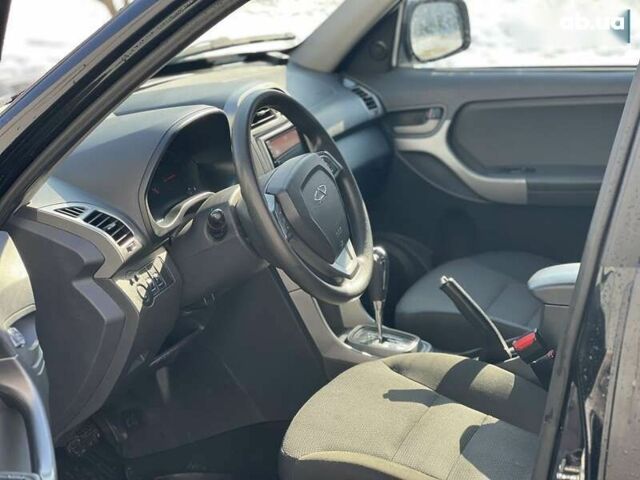 Черный Чери Тигго, объемом двигателя 1.8 л и пробегом 104 тыс. км за 5700 $, фото 11 на Automoto.ua